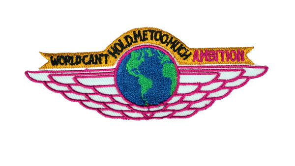 3" in length sew-on embroidery patch with the words "World Can't Hold Me Too Much Ambition"